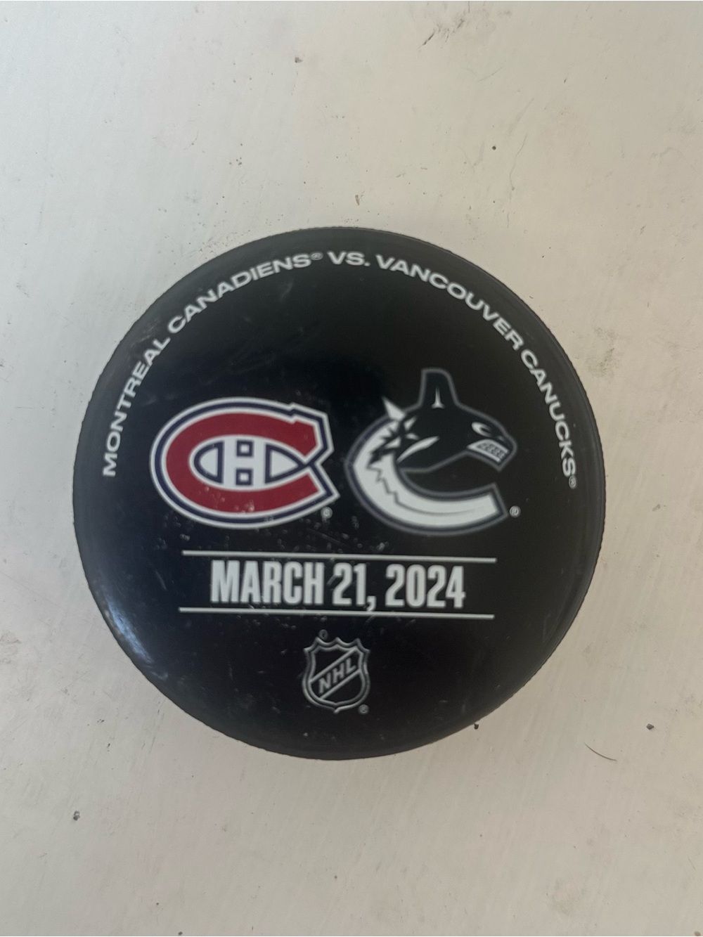 NHL Official Warm-Up Puck Montreal Canadiens vs Vancouver Canucks Mar 21 2024